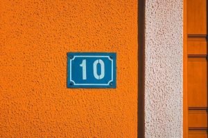 this is a picture of a number 10 door sign in high contrasts for an article entitled 10 ways to catch and solve business problems quicker by Octopus Intelligence. We isolate your problems, reduce risk and uncertainty and deliver intelligence-led answers and innovative solutions. Dedicated to help you win.