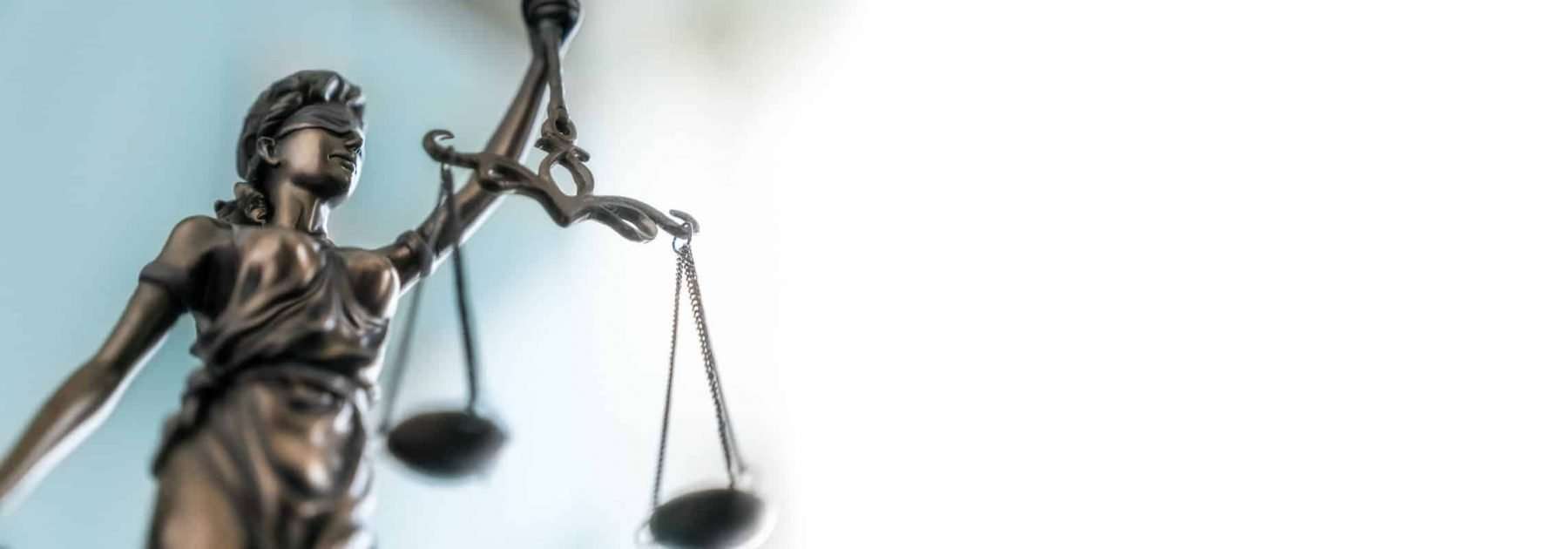 This is a picture of Statue of lady justice on bright background for an article Litigation support complex legal investigationsfor your business brought to you by Octopus Intelligence who help you beat your competitors