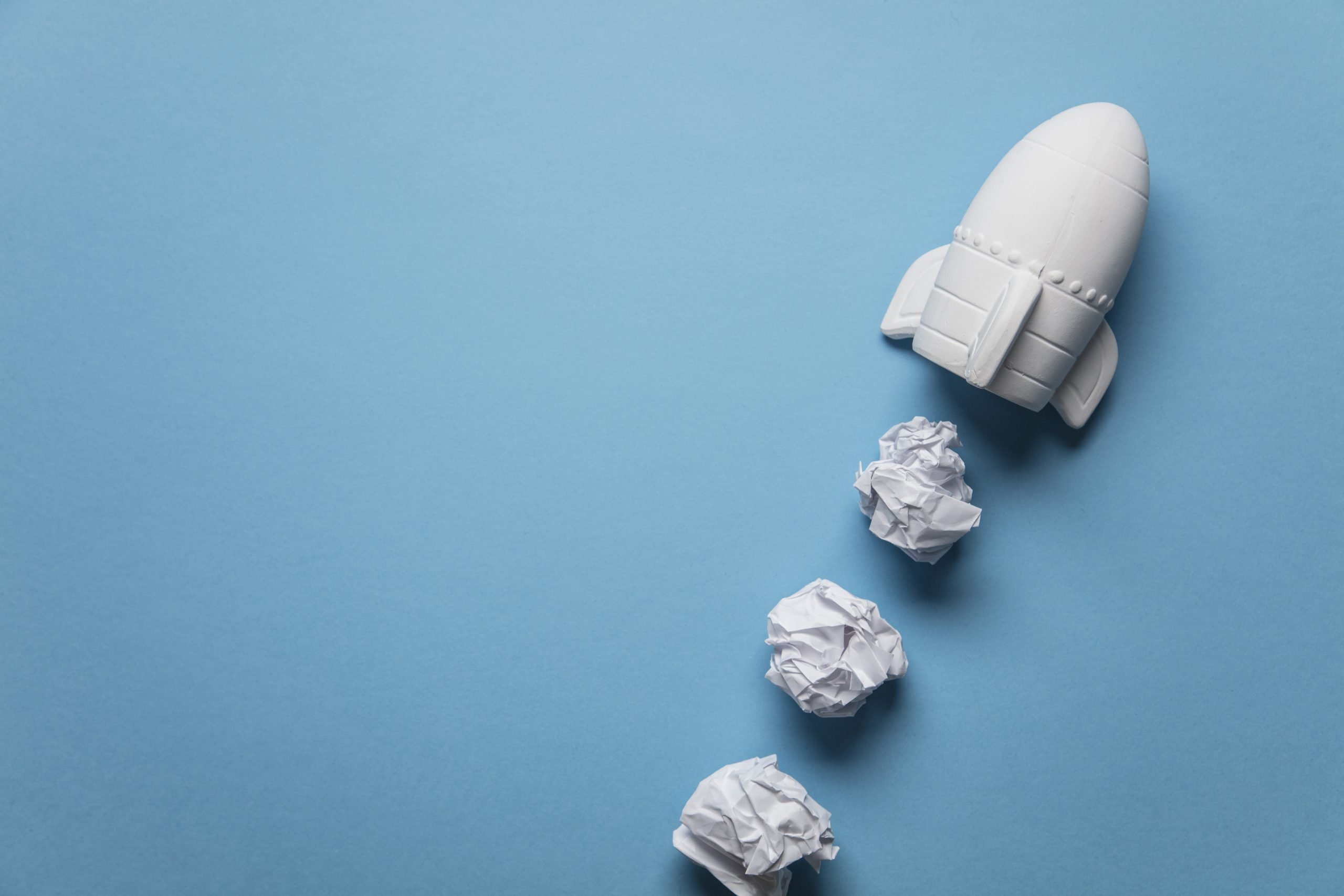 This is a picture representing a Rocket taking off with crumpled paper trail for an article called the importance of Competitive Intelligence and analysis for 2021 business planning by Octopus Competitive Intelligence beat competitors, increase sales, reduce risk, solve problems, Competitor Analysis. The Importance Of Competitive Intelligence. How to Write a Competitor Analysis for a Business Plan what is the importance of market and industry analysis?