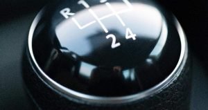 This is a picture of a gear stick in reverse for an article called What is Linchpin Analysis within Competitor Analysis by Octopus Competitive Intelligence and Competitor Analysis