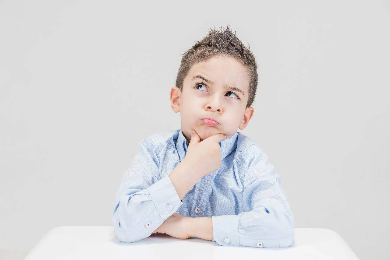 This is picture of a thinking boy at a desk for an article called 11. Leverage competitive intelligence to stay ahead whatever the size of your businessquestions to help you do a Competitive Strategy by Octopus Competitive Intelligence, Market Intelligence Competitor Analysis get in touch no obligation chat.Leverage competitive intelligence to stay ahead whatever the size of your business. Leveraging Competitive Intelligence: Propelling Business Growth to New Heights