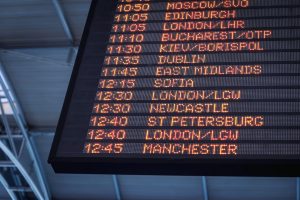 This is a picture of an airport departure board for an article called Competitive Intelligence questions to NATS Strategy Analysis and Development manager by Octopus Competitive Intelligence Competitor Analysis and Corporate Investigations