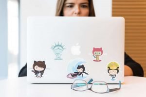 This is an image of a person coding on a Mac for an article called Competitive Intelligence Analysts Need to Learn to Code Says Trip by Octopus is a Competitive Intelligence Competitor Analysis & Strategy consulting firm focused on creating certainty, insight, competitive advantage & significant growth. Effective ways to clean the application memory on your Mac