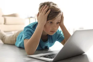 This is a picture a boy on the floor with his laptop looking shocked for an article called Why Intelligence Research is Critical for Future Business Success by Octopus Competitive Intelligence Competitor Analysis focused on creating certainty How to estimate market size in Competitive Intelligence. The Future of Online Learning Platforms. Analyse Competitor Online Presence and reputation. How to Optimize Learning and Development with Digital Solutions. Why Staying On Top of Stock Levels Can Give You A Competitive Edge Over Other Businesses