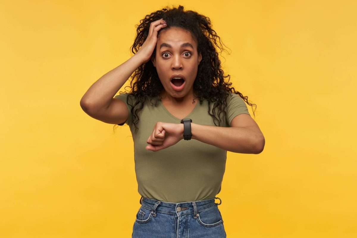This is an image of a amazed and shocked female keeps her hand on head starring into camera with stressed facial expression she missed her bus for an article called Competitive Intelligence Research and urgent last-minute enquiries by Octopus Competitive Intelligence Competitor Analysis focused on creating certainty
