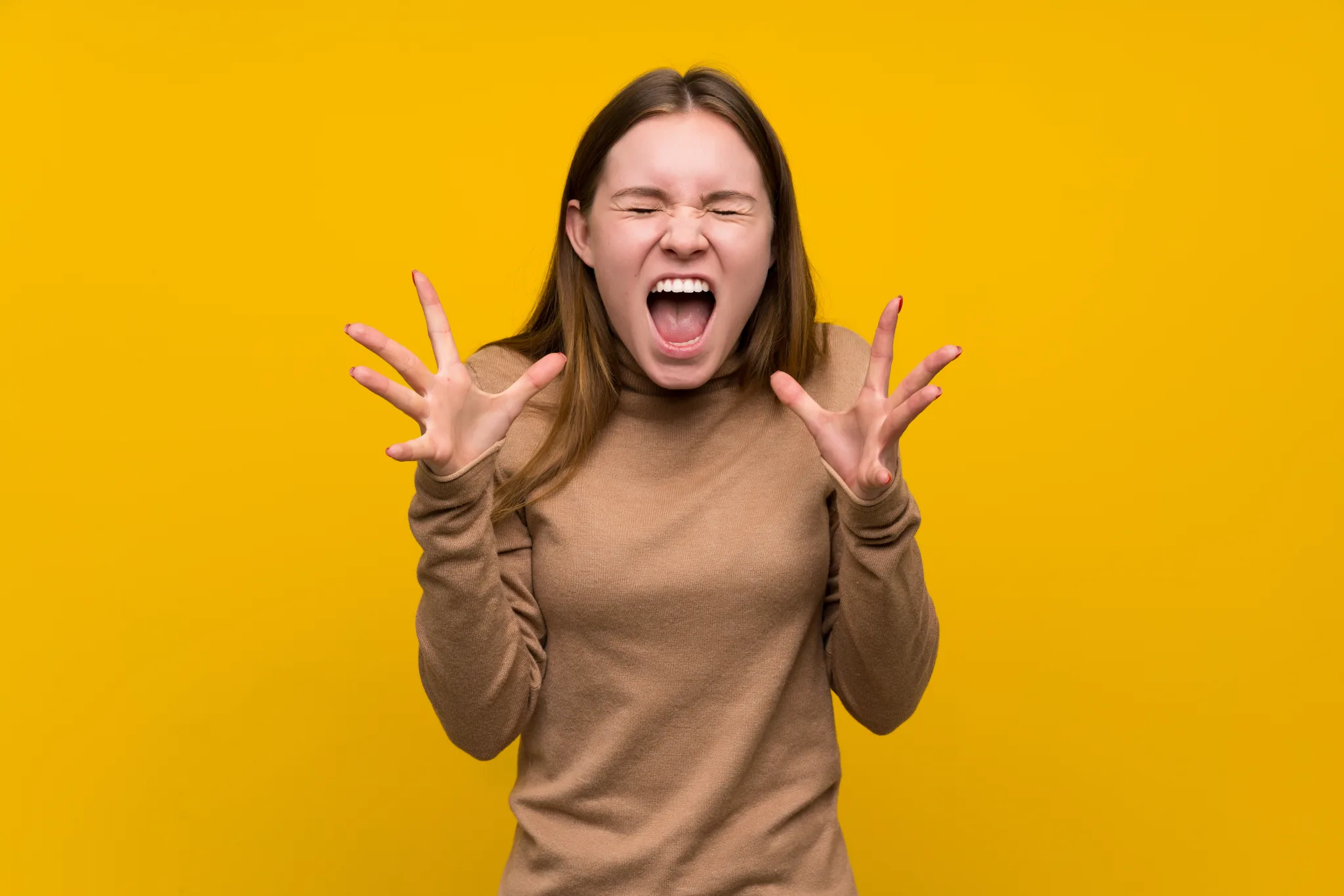 this is an image of a frustrated woman for an article called VUCA, BANI or CI? by Ben Gilad Octopus Competitive Intelligence & Future Insights Global Advisory consulting agency