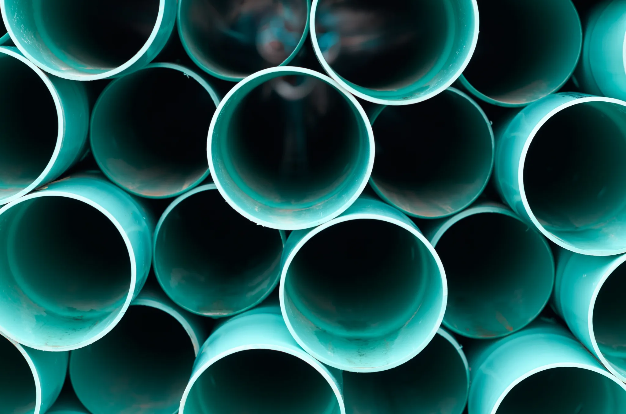 This is an image of plastic pipes for a guest article called PVC Pipes Market: Industry Insights, Drivers, Opportunities, and Future Prospects By Octopus Competitive Intelligence consulting agency