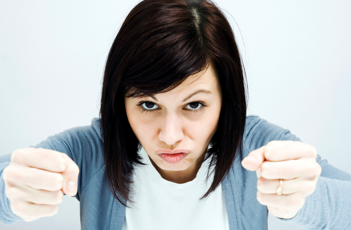 This is an image of a women pretending to be a crazy driver for an article called Why competitive intelligence is not data-driven by octopus competitive intelligence company market intelligence solutions and competitor analysis services