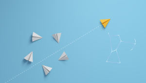 This is an image of paper boats with one moving in a new direction with the Orion constallation for an article called Real life competitive intelligence story and the growth of Orion Data Technologies by octopus competitor insight agency octopus competitive intelligence agency. How Do You Analyse Industry Growth? A Comprehensive Guide to Market Growth Analysis. Market Growth Analysis is A Key to Business Success