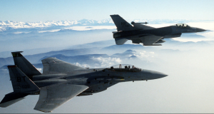 This is an image of two fighter aircraft in the clouds for an article called Intelligence Estimation in Conflict Zones and What does it teach us in business by octopus competitive intelligence agency octopus corporate intelligence solutions