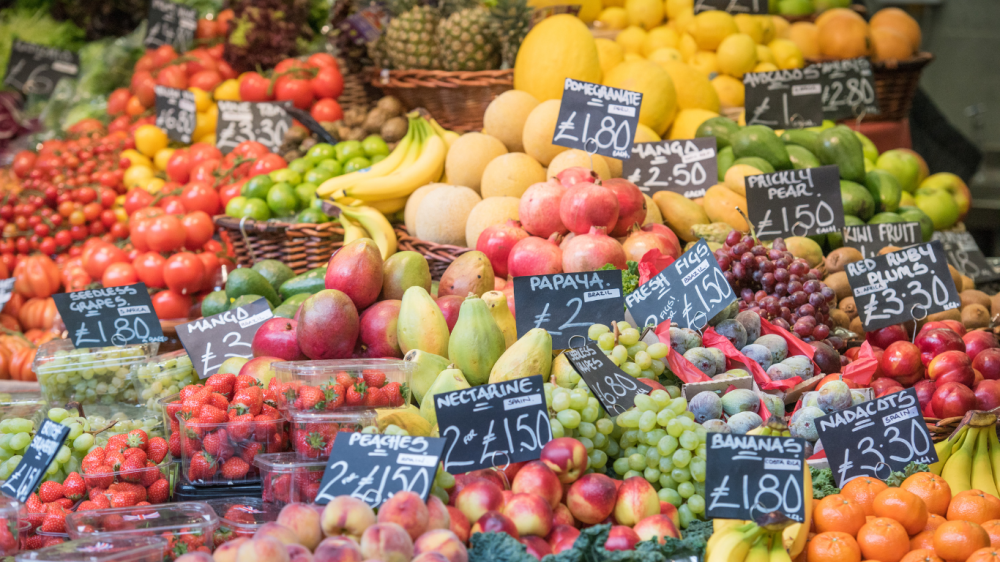 This is an image of a London fruit stall for an article called Crafting a Competitive Advantage Through Strategic Pricing in Highly Competitive Markets by octopus competitive intelligence solutions octopus competitive intelligence agency